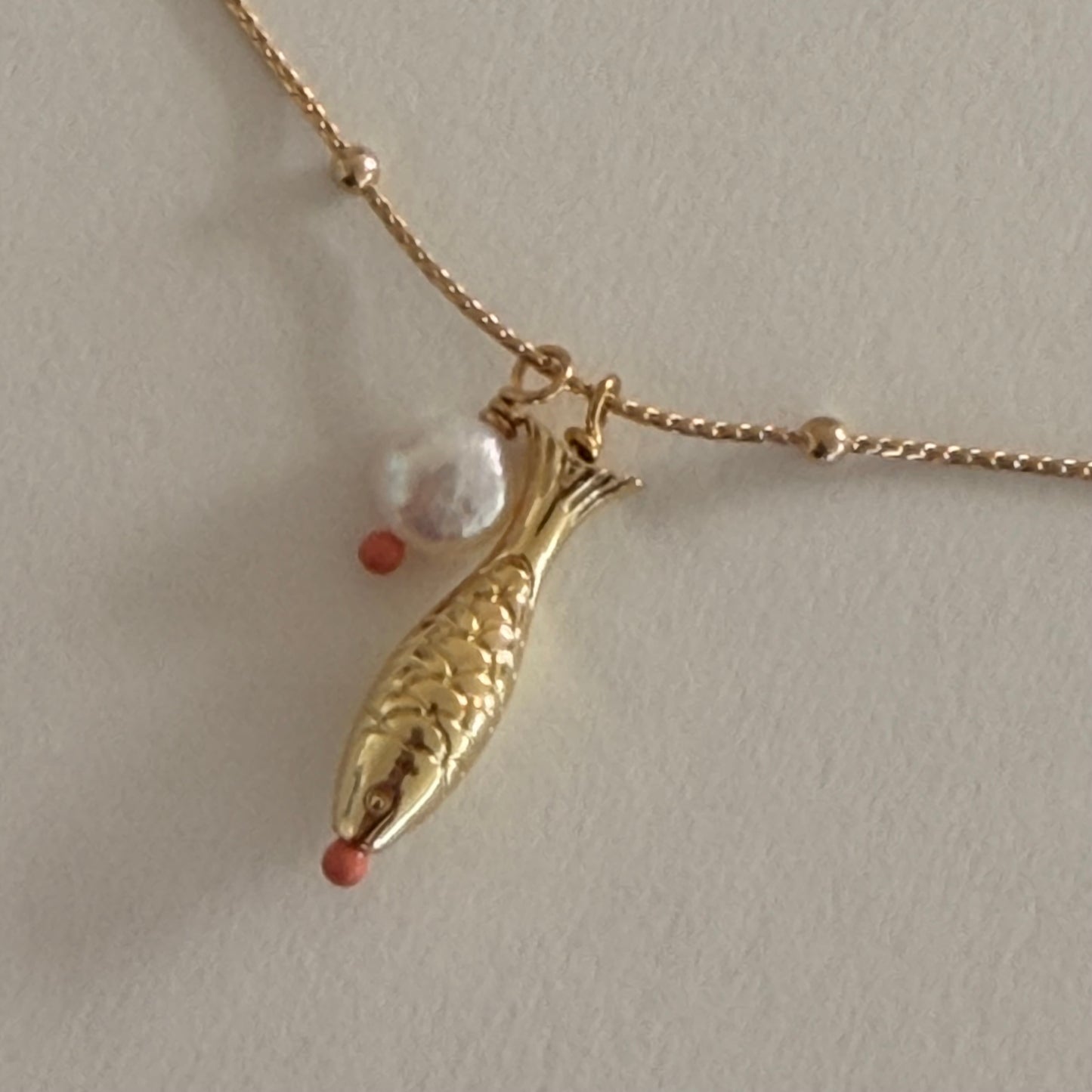 Pearl and Orange dot Fish Necklace